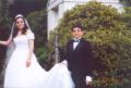 Yevgeniya getting ready to enter the location where the wedding ceremony is to be held; her brother Yan (one of the groomsmen) is holding her train (a.k.a. "tail")., 875x592, 99 Kb